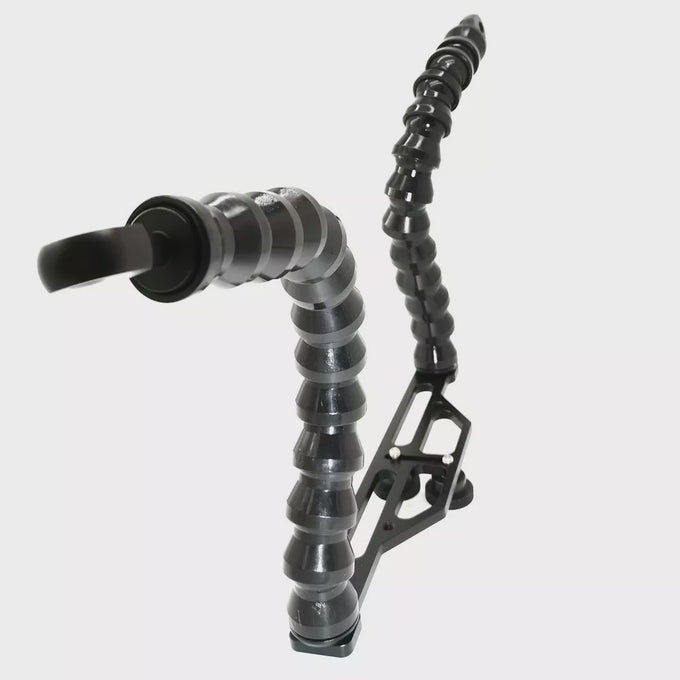 Flex arm tray for compact digital camera housing